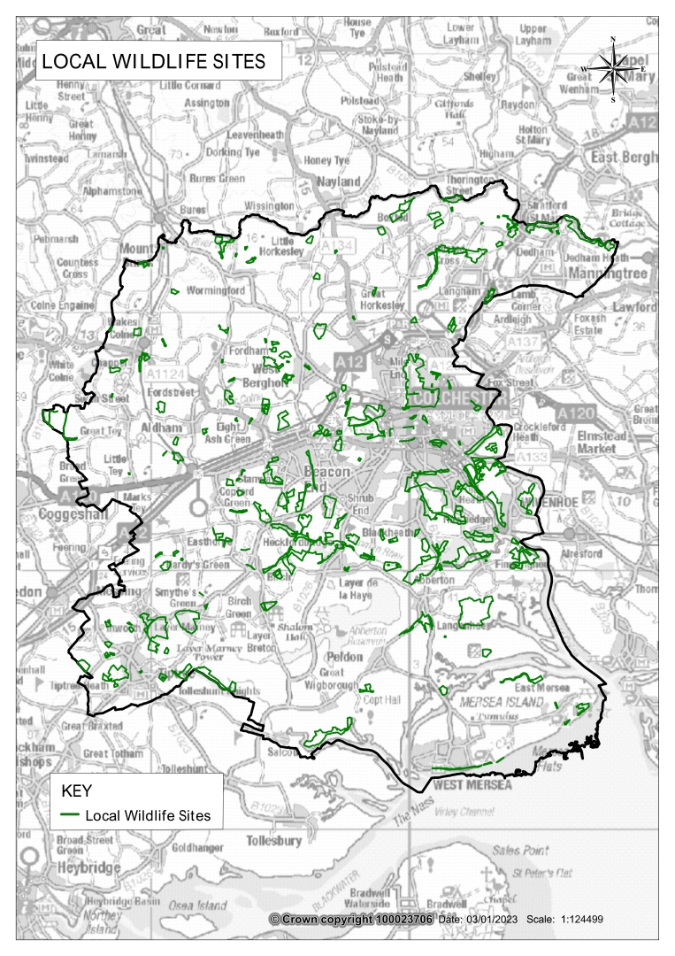 Image is of a map showing a black line around the Colchester district boundary, with an inset key listing the designation of Local Wildlife Sites also known as LoWS. These are shown as green lines and are scattered across the map in various locations. 