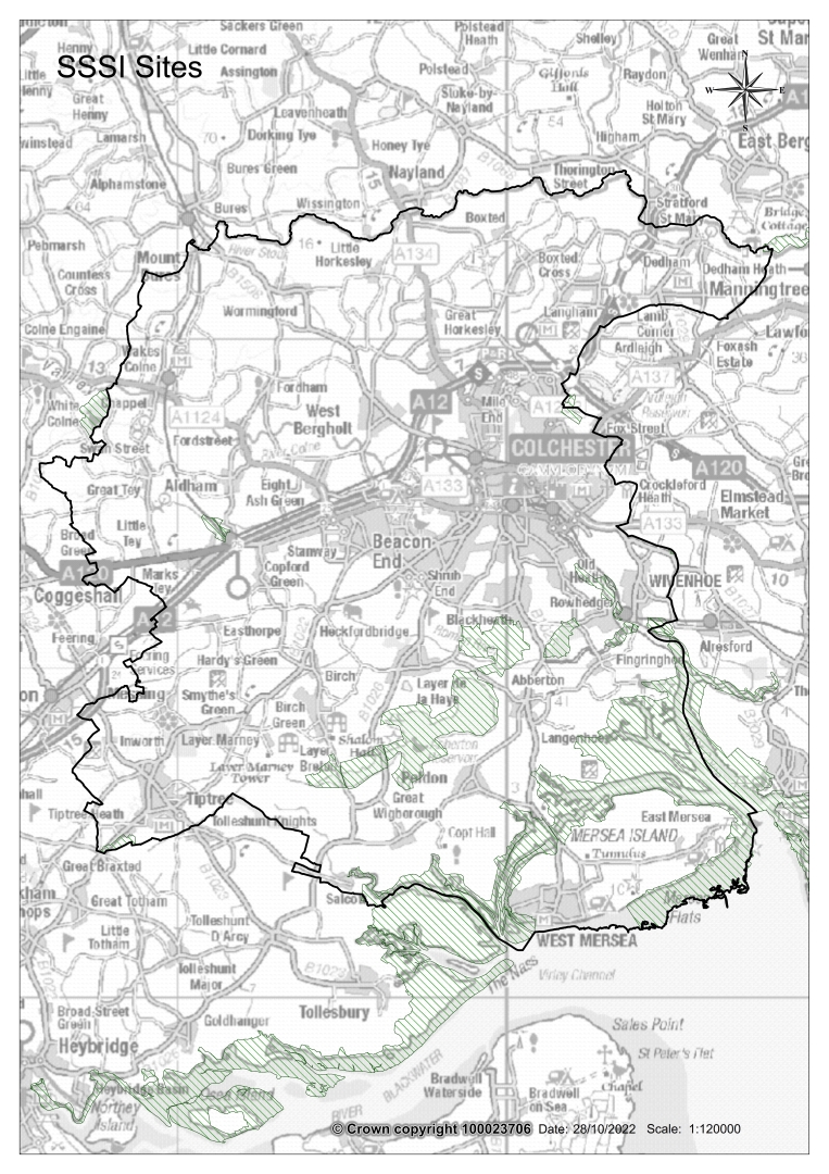 Image is of a map showing a black line around the Colchester district boundary, showing the designation of the Sites of Special Scientific Interest also known as SSSI. The designations are shown in green diagonal lines and located towards the south of Colchester, along the estuary and coastline.